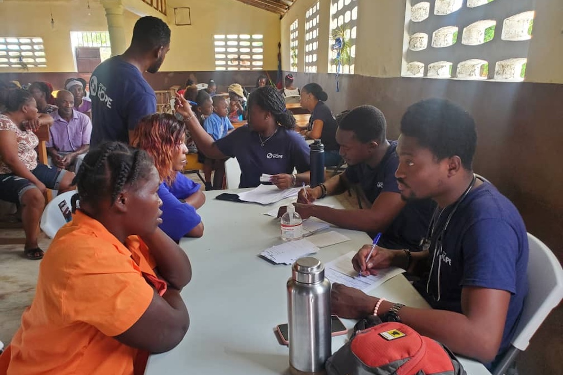 Medical staff in Haiti checking in on patients.