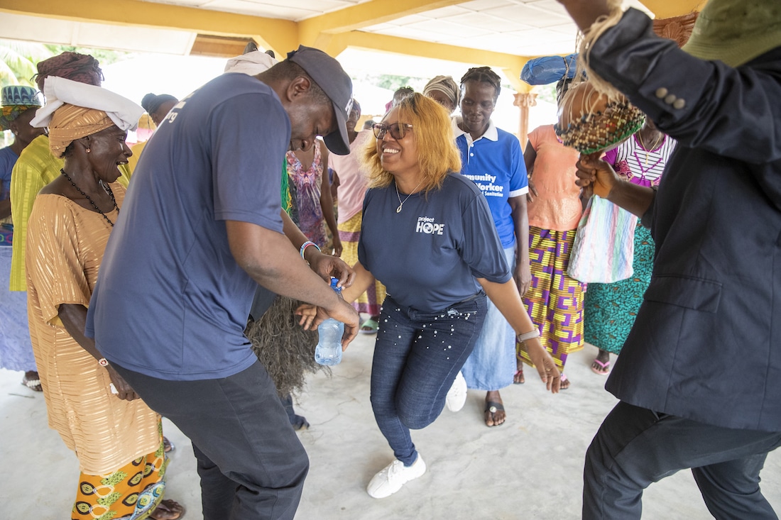 A group of people dancing in Sierra Leone