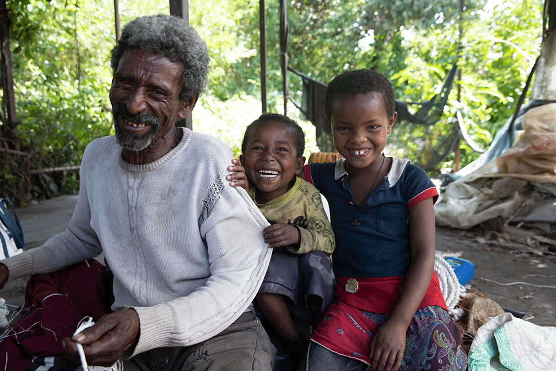 man with two children