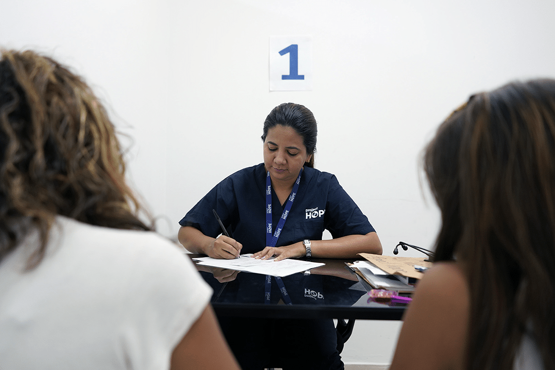 Doctor seeing patients