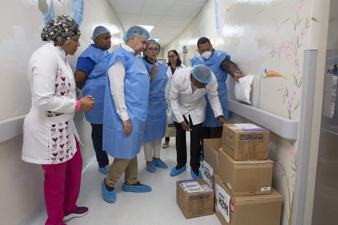 Doctors and nurses looking at new deliveries from Project HOPE