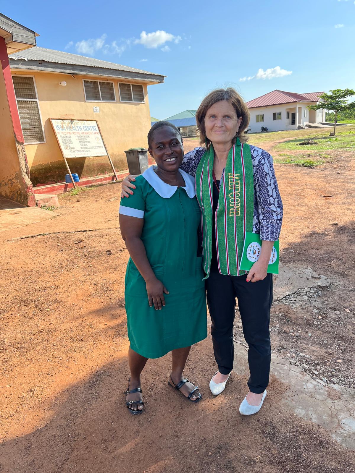 Two women standing together in Ghana